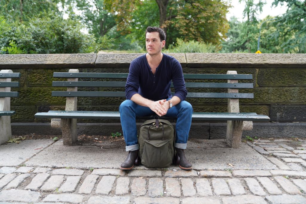 filson journeyman backpack park bench