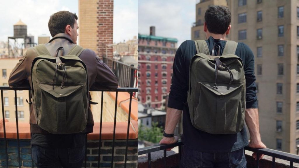 filson journeyman with brown jacket and black tshirt