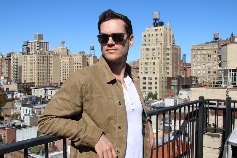 Flint and Tinder Flannel-Lined Waxed Trucker Jacket leaning
