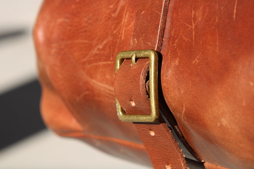 satchel and page mailbag buckle