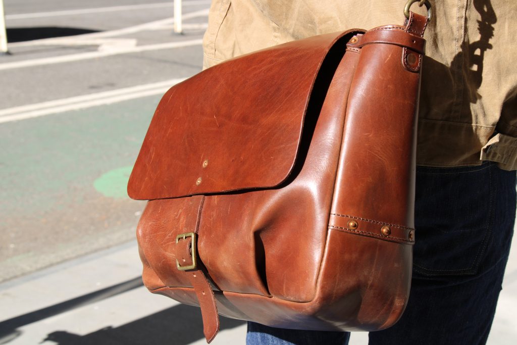 satchel and page mailbag leather