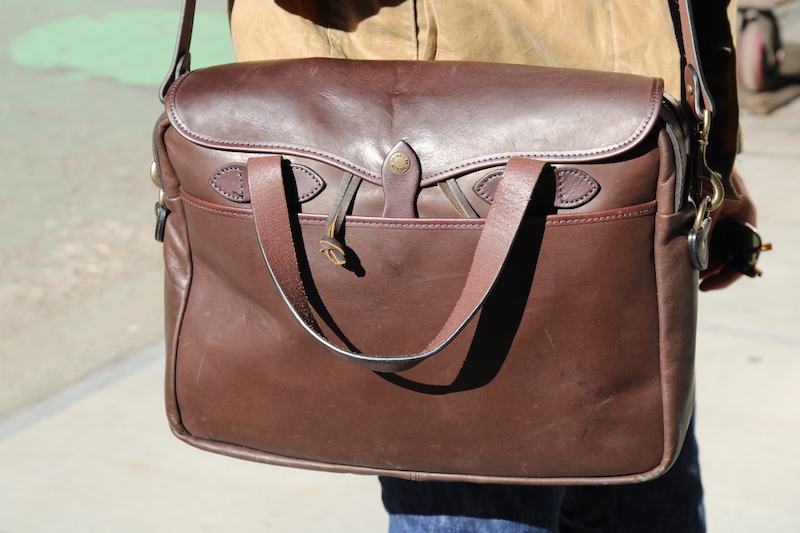 filson leather briefcase sunlight