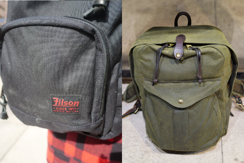 Filson Journeyman next to Dryden Logo