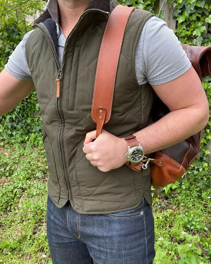 Dale wearing a nice watch, bag, and denim