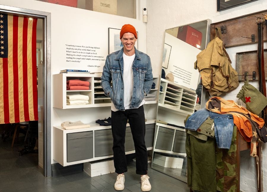 Levi's type 3 denim trucker jacket with a white t shirt, black jeans, and white sneakers