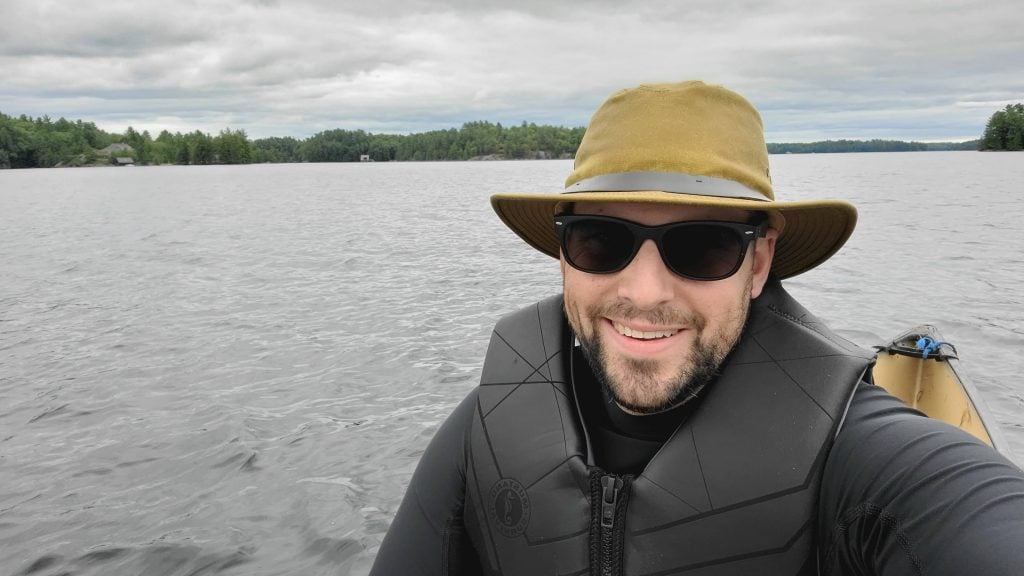 filson tin cloth packer hat on head