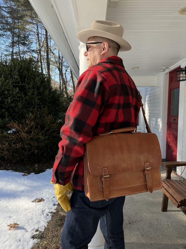 linden leather messenger bag on body