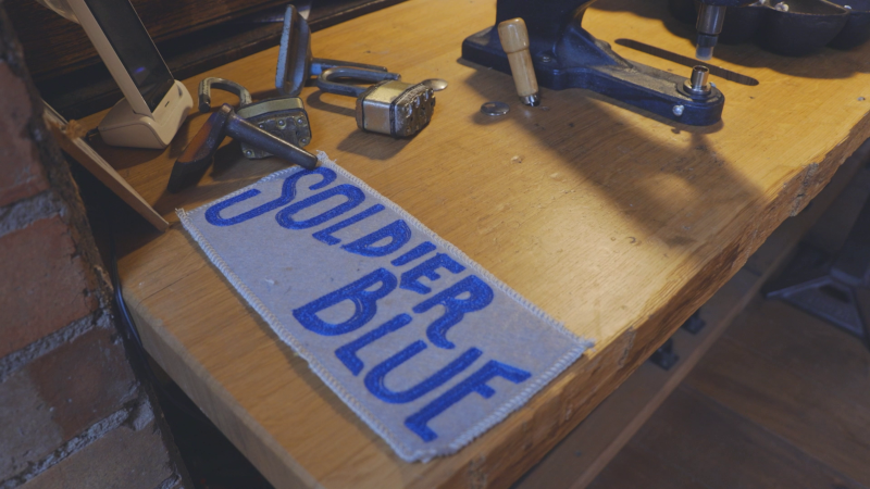 Darning Denim Soldier Blue Sign