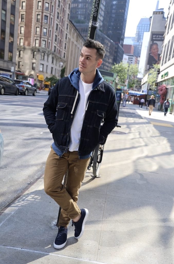 blue denim jacket, blue suede sneakers, tan pants