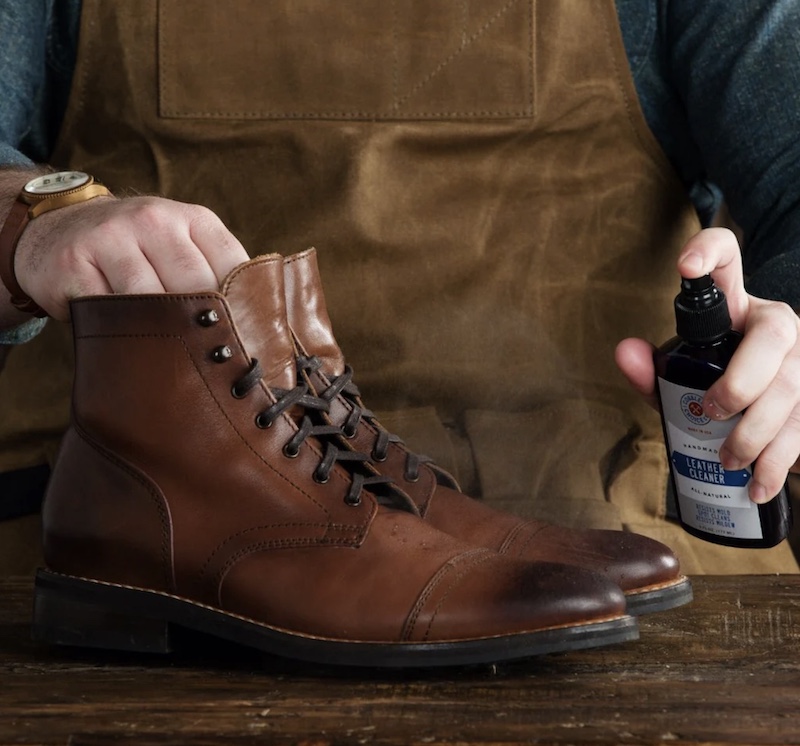 Preparing to clean a pair of brown leather boots with cobblers choice leather cleaner