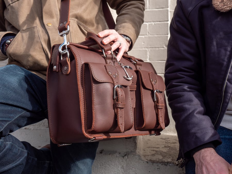 saddleback leather flight bag in sun