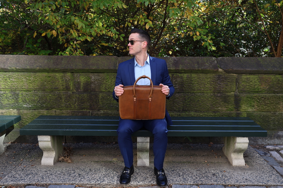 satchel and page counselor briefcase with suit