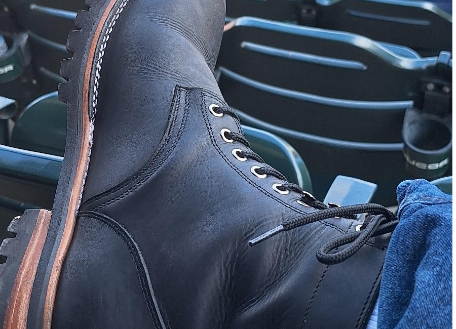 Cordobes service boot leather up close with visible wrinkles from wear and tear