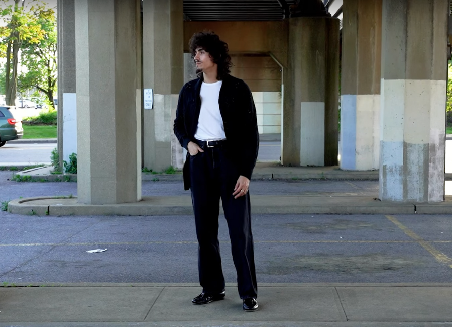 Black loafers with a black coat and white t shirt