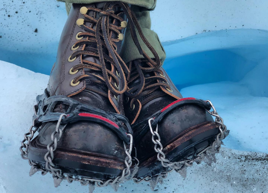 A pair of maduro shell cordovan with crampons on a glacier