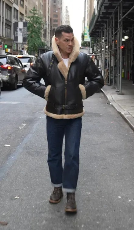 B3 shearling jacket on nick as he walks down street