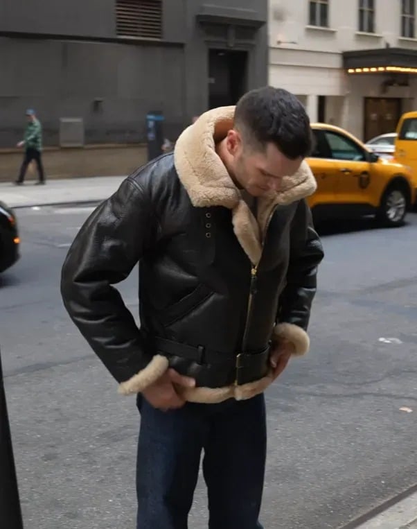 B3 shearling Jacket worn by nick on street with head looking down