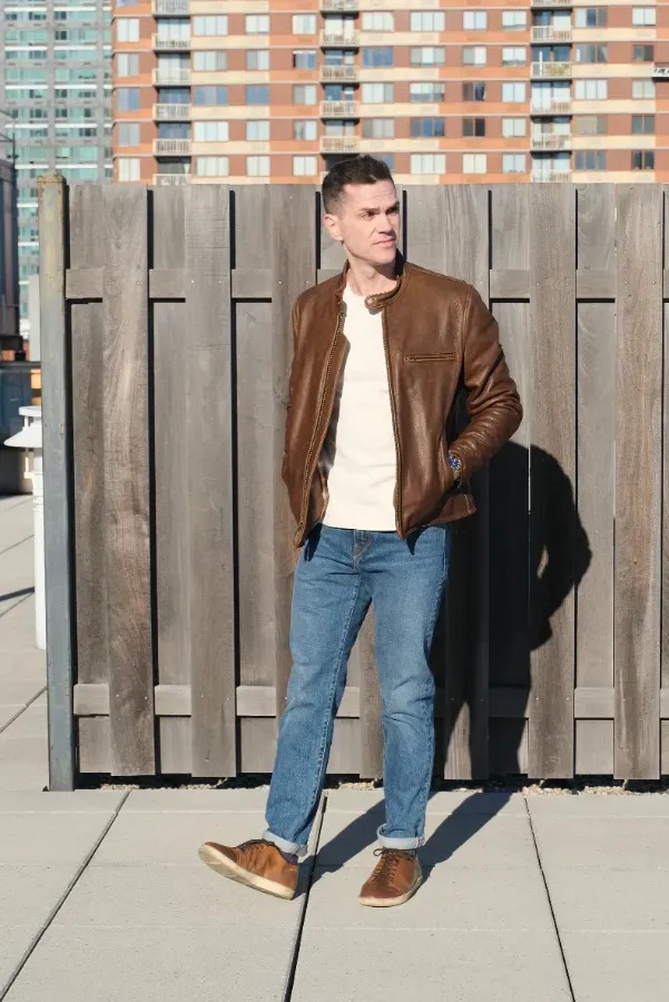 Brown jacket jeans white shirt
