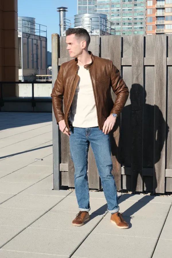 Brown jacket jeans white shirt