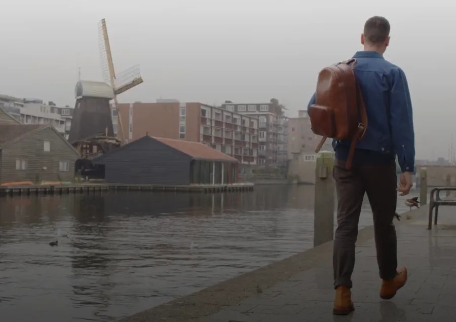 Nick walking in amsterdam wearing canvas