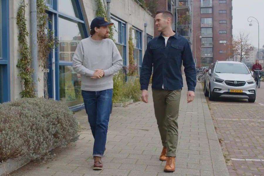 Walking down street with benzak founder